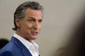 Southern California school board OKs curriculum after Gov. Gavin Newsom threatened a $1.5M fine | AP News