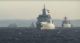 China, Russia navy ships jointly sail through Japan strait | Reuters